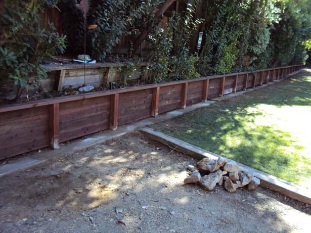 3 ft pressure-treated retaining wall