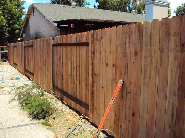 good neighbor fence with metal master post